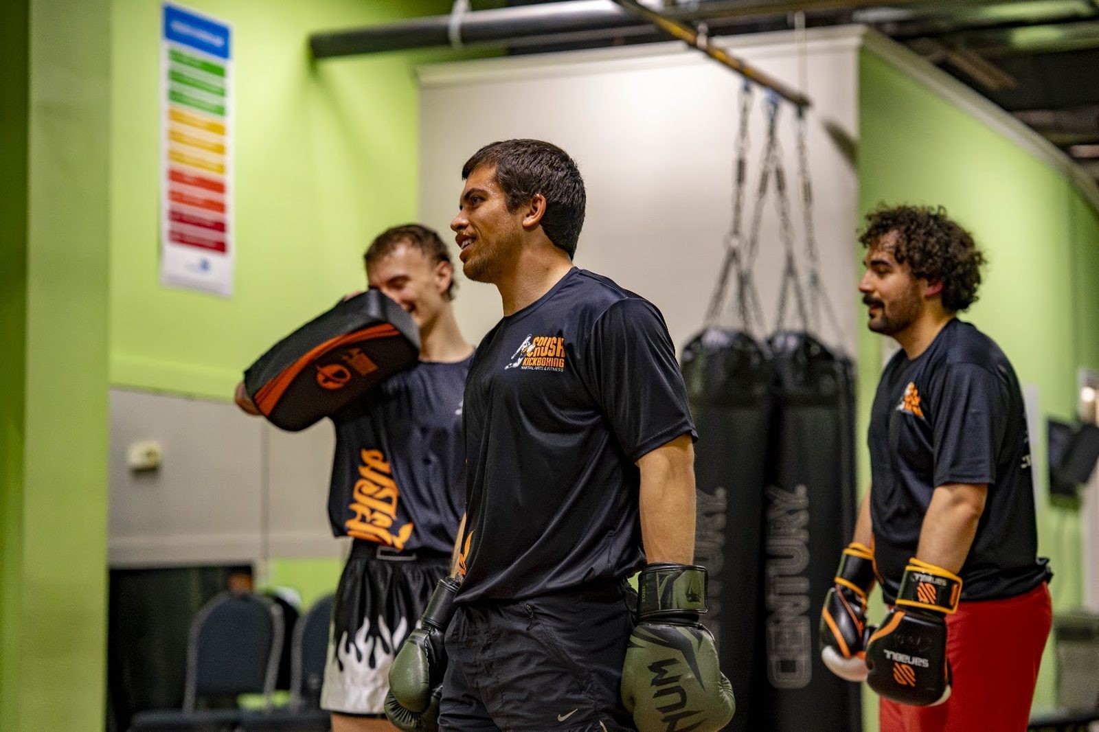 Adult Muay Thai pad work at Crush Kickboxing