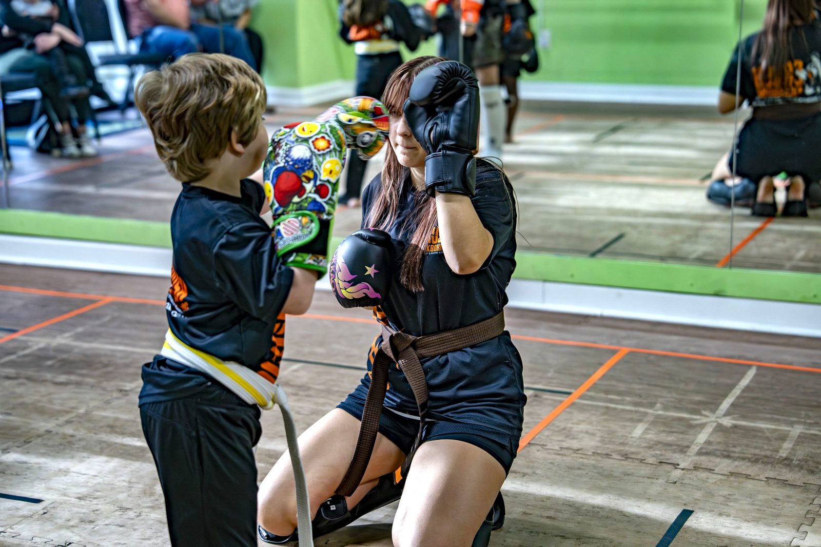 Crush Kickboxing kids and teen students training together in Little River, SC