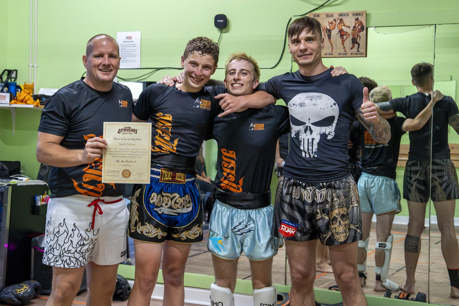 Saxon earning his black belt at Crush Kickboxing
